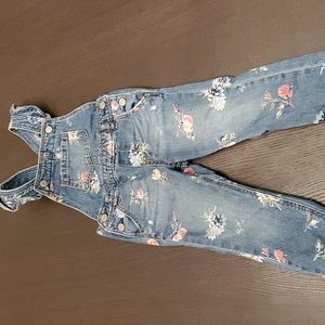 GAP denim floral overalls with button closure. Size 2